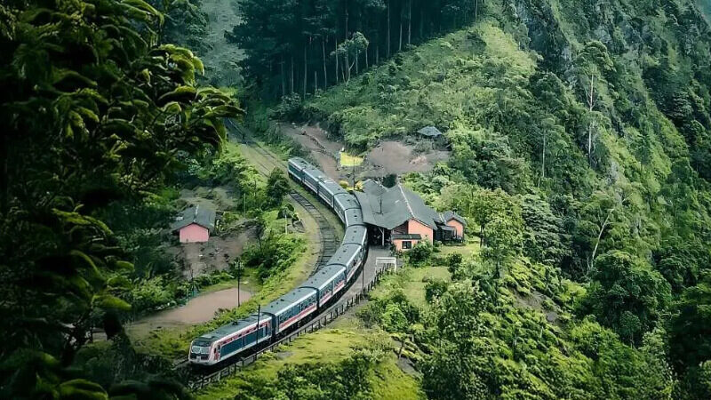 kaya-img-97 The hill-country railway winding through tea-covered slopes on the Kandy to Ella train route
